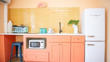 Fridge, microwave, cookware/dishes/utensils