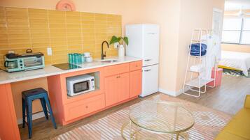 Fridge, microwave, cookware/dishes/utensils