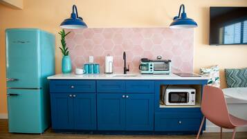 Fridge, microwave, cookware/dishes/utensils