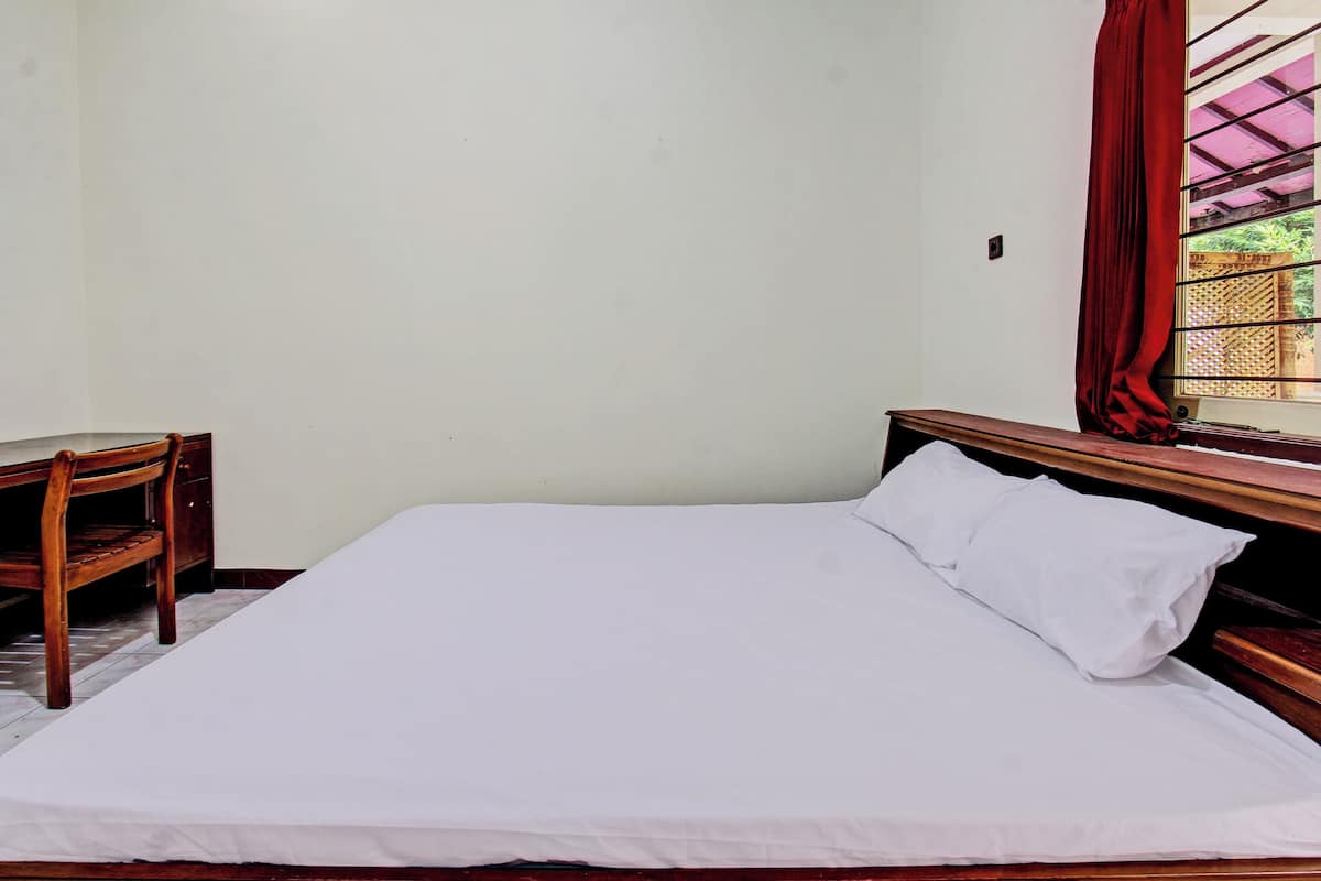 Chambre Double Deluxe | Draps fournis