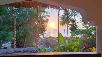 Laptop workspace, bed sheets