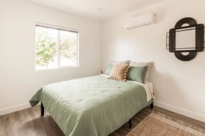 2 dormitorios, escritorio, tabla de planchar con plancha y wifi gratis