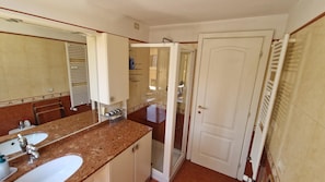 Shower, eco-friendly toiletries, hair dryer, towels