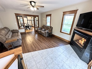 Smart TV, fireplace, books