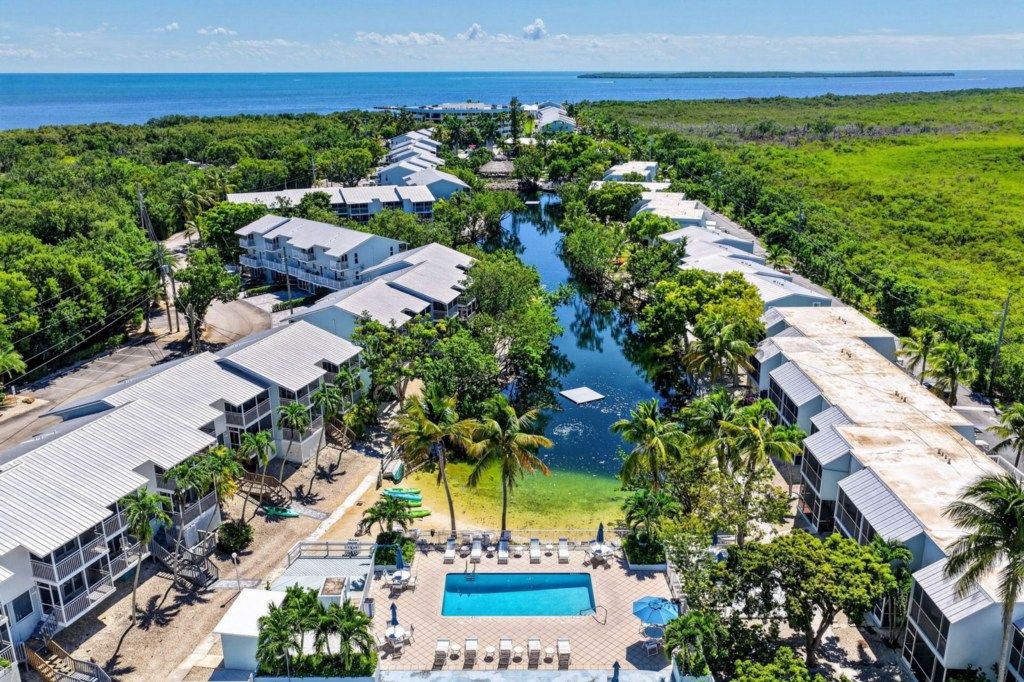 Aerial: 4.5 acre salt water lagoon with tropical fish | Kawama Yacht Club & Resort