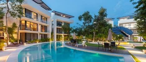 2 outdoor pools, pool umbrellas, pool loungers