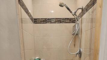 Hair dryer, towels, soap, shampoo