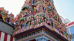 A temple with intricate carvings and statues. - Aura Hotel Mackenzie (Singapore)
