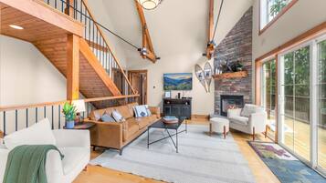 Smart TV, fireplace, table football, books