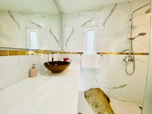 Hair dryer, towels, soap, toilet paper