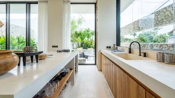 Luxury Villa | Private kitchen | Fridge, microwave, stovetop, electric kettle