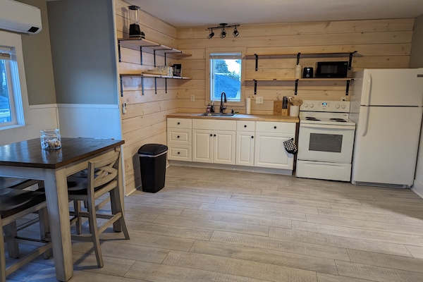 Coffee/tea maker, fridge, microwave, oven