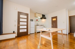 City Condo, Non Smoking (103) | Living area | Flat-screen TV - Furano Zone Ski Condo (Furano)