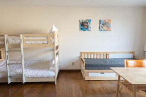 City Condo, Non Smoking (103) | Living area | Flat-screen TV