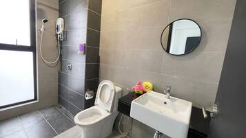 Hair dryer, towels, soap, toilet paper