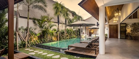 Outdoor pool, pool umbrellas, sun loungers