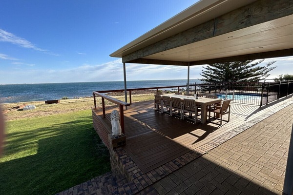 Rear Decking & Dining Area with Beach Frontage