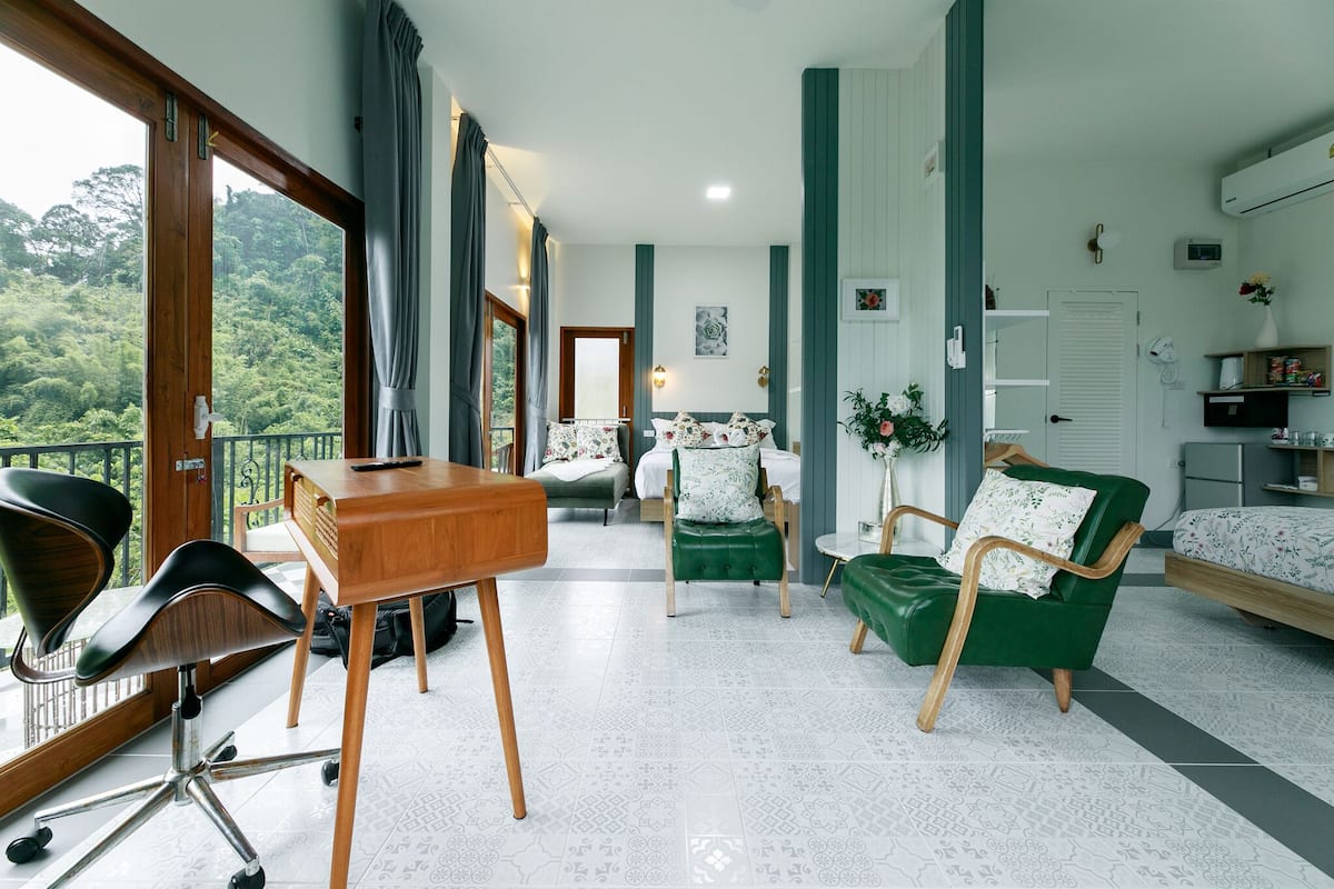 Family Room | 1 bedroom, in-room safe, individually decorated, desk