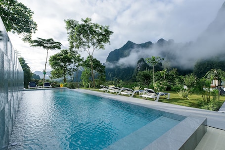 2 outdoor pools, sun loungers