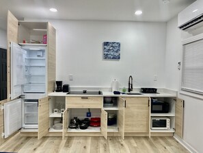 Fridge, microwave, coffee/tea maker, toaster