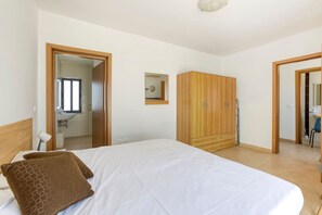 1 bedroom, desk, iron/ironing board, travel cot