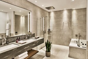 Designer toiletries, hair dryer, bathrobes, slippers