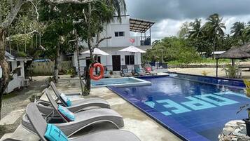 Outdoor pool, open 5:00 PM to 9:00 PM, sun loungers