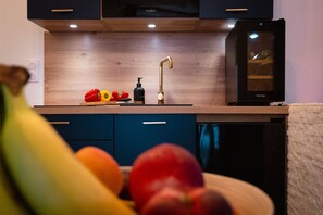 Fridge, microwave, stovetop, coffee/tea maker