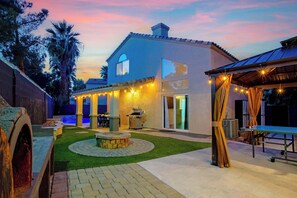 Outdoor dining - Pool, Hot Tub, & Games at 5BR Fun Family Getaway (North Las Vegas)