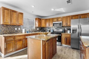 Fridge, oven, stovetop, coffee/tea maker - Pool, Hot Tub, & Games at 5BR Fun Family Getaway (North Las Vegas)