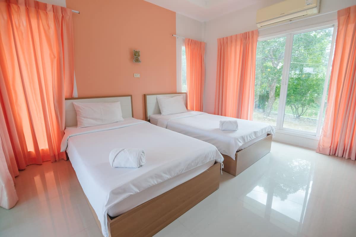 Down comforters, pillowtop beds, WiFi (free), individually decorated