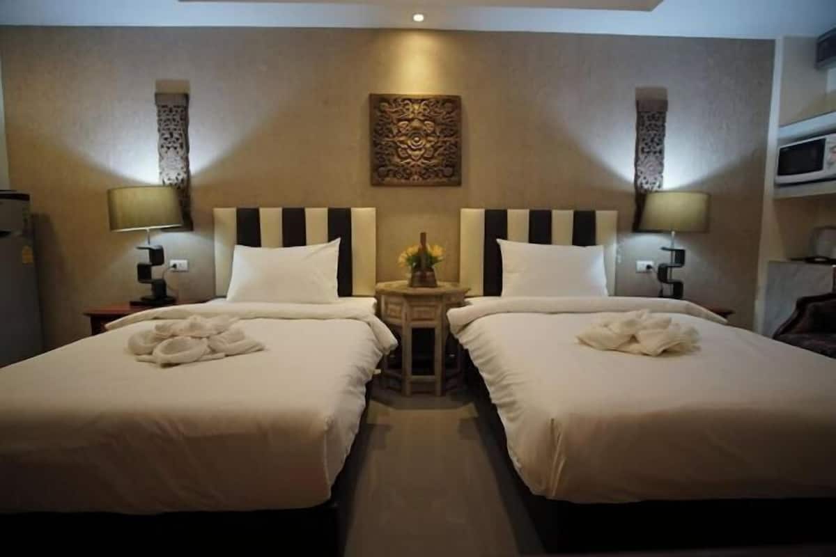 Meja kerja, tempat tidur lipat/tambahan, Wi-Fi gratis, dan seprai linen