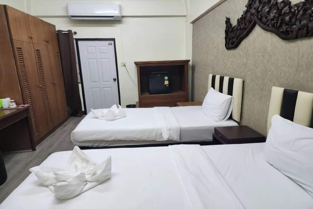 Meja kerja, tempat tidur lipat/tambahan, Wi-Fi gratis, dan seprai linen