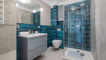 Shower, hair dryer, shampoo