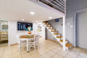 Family Loft | Living area | 32-inch LCD TV with satellite channels - Toledo house Apartments (Naples)