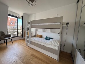 3 bedrooms, desk, iron/ironing board, travel cot