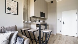 Apartamento (117L/ A73) | Área de estar | TV de tela plana