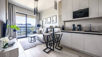 Apartment (117L/ A73) | Private kitchen | Fridge, microwave, stovetop, dishwasher