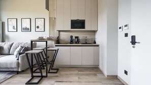 Apartment (117L/ A73) | Private kitchen | Fridge, microwave, stovetop, dishwasher