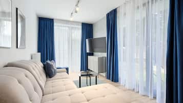 Apartament (0.3) | Living area | Flat-screen TV