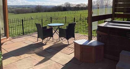 Holiday lodge with private hot tub, fabulous far reaching views
