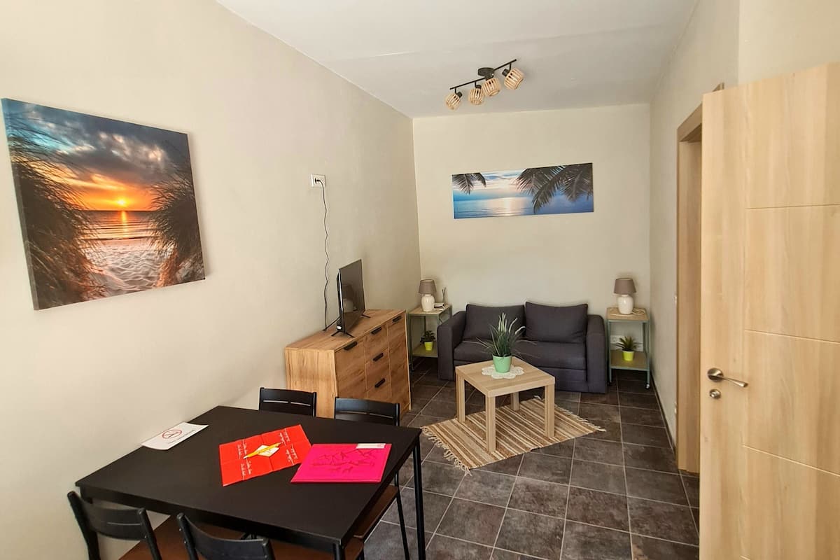 Deluxe appartement | Woonruimte | Een smart-tv