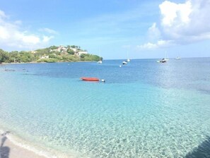 Enjoy serene coastal views, relax on the beach, and explore the surrounding waters with a sailboat.