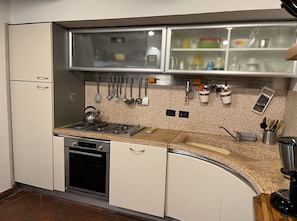 Villa | Private kitchen | Full-sized fridge, oven, stovetop, dishwasher
