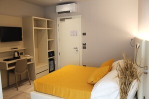 Classic Room, 1 King Bed, Partial Sea View | 1 bedroom, down comforters, memory foam beds, in-room safe