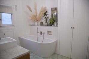 Hair dryer, towels, soap, shampoo