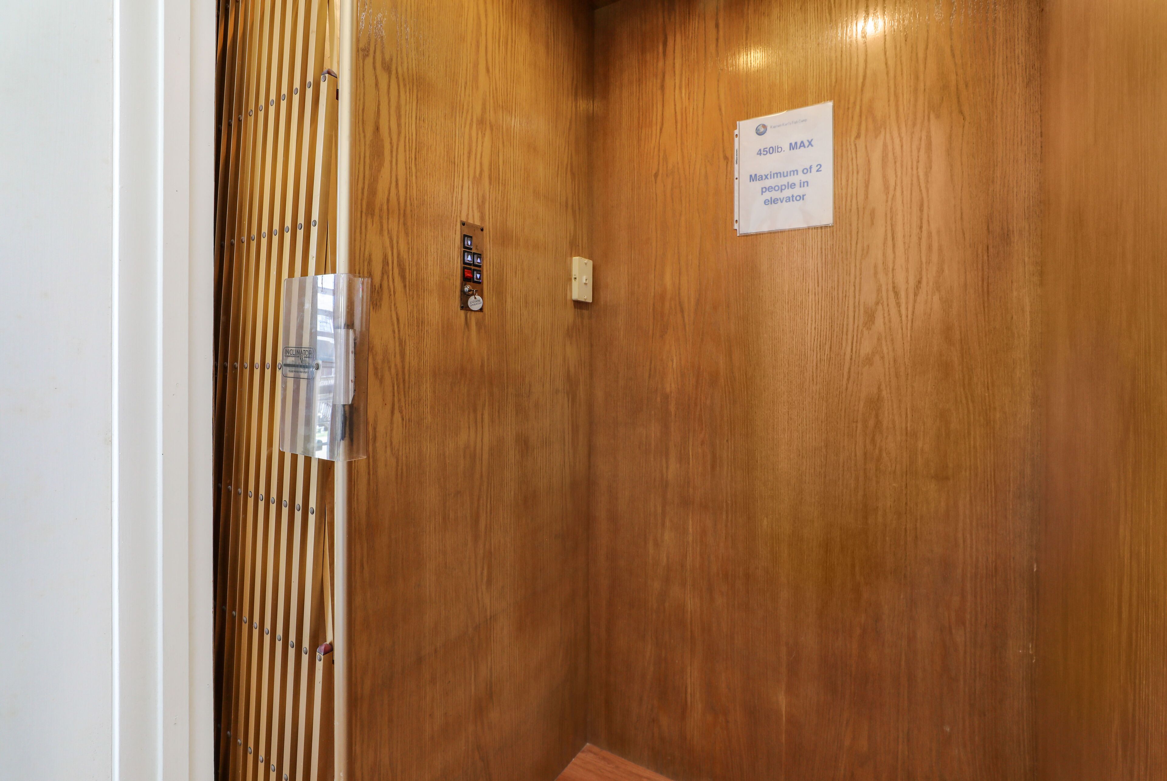 The elevator has a weight limit of 450 pounds for groceries/luggage/handicapped