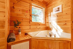 Jetted tub, towels, soap, toilet paper