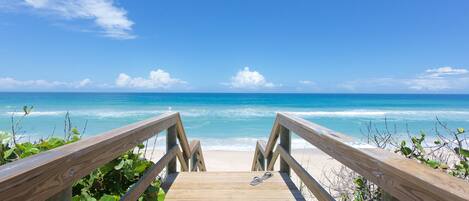 On the beach, sun-loungers, beach towels