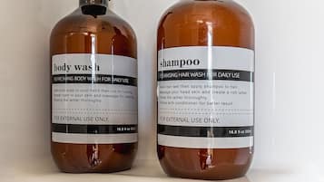 Two bottles of body wash and shampoo with pumps, labeled for external use only, each containing 16.9 fl oz 500ml.